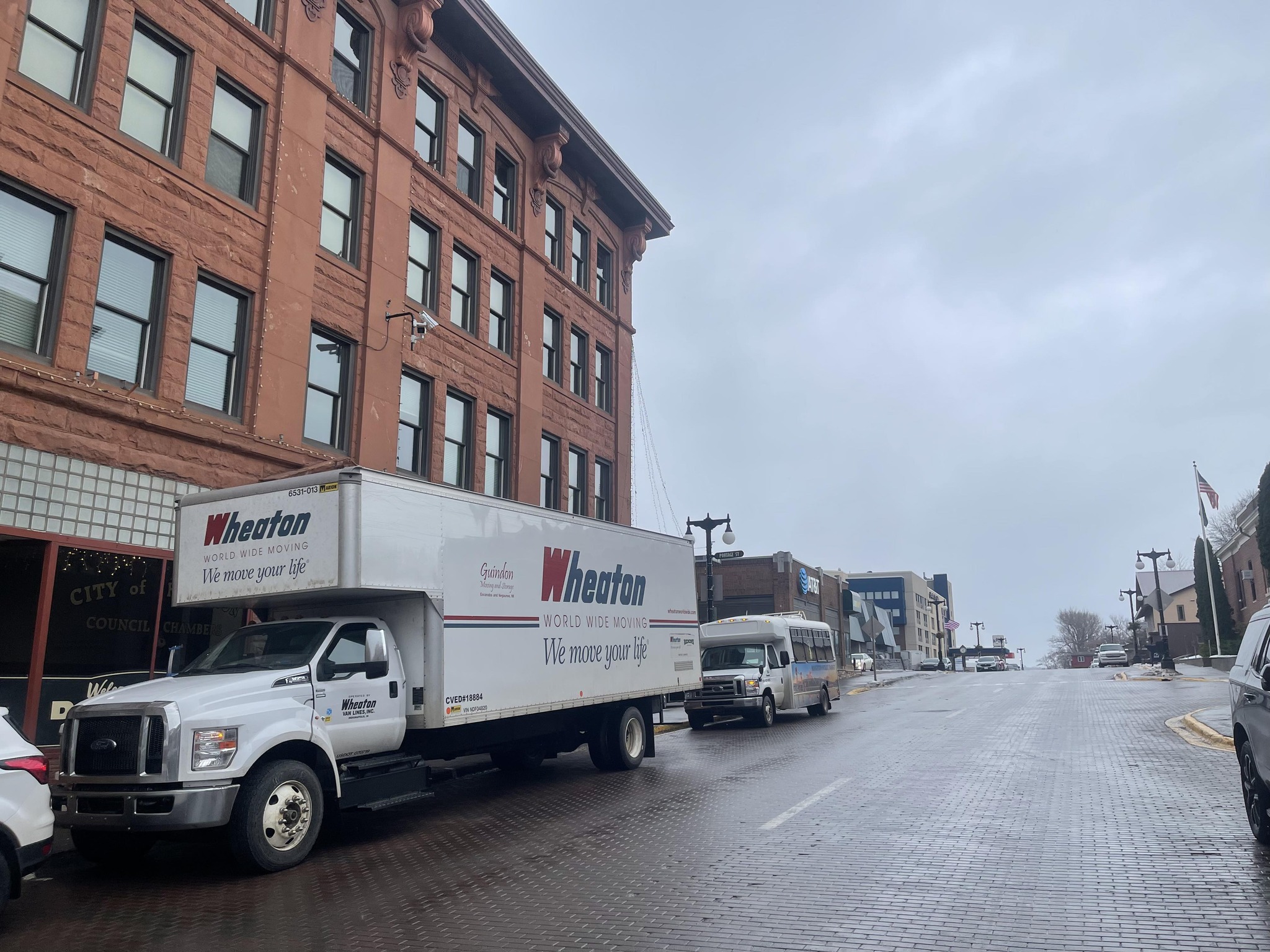 moving truck in front of a building
